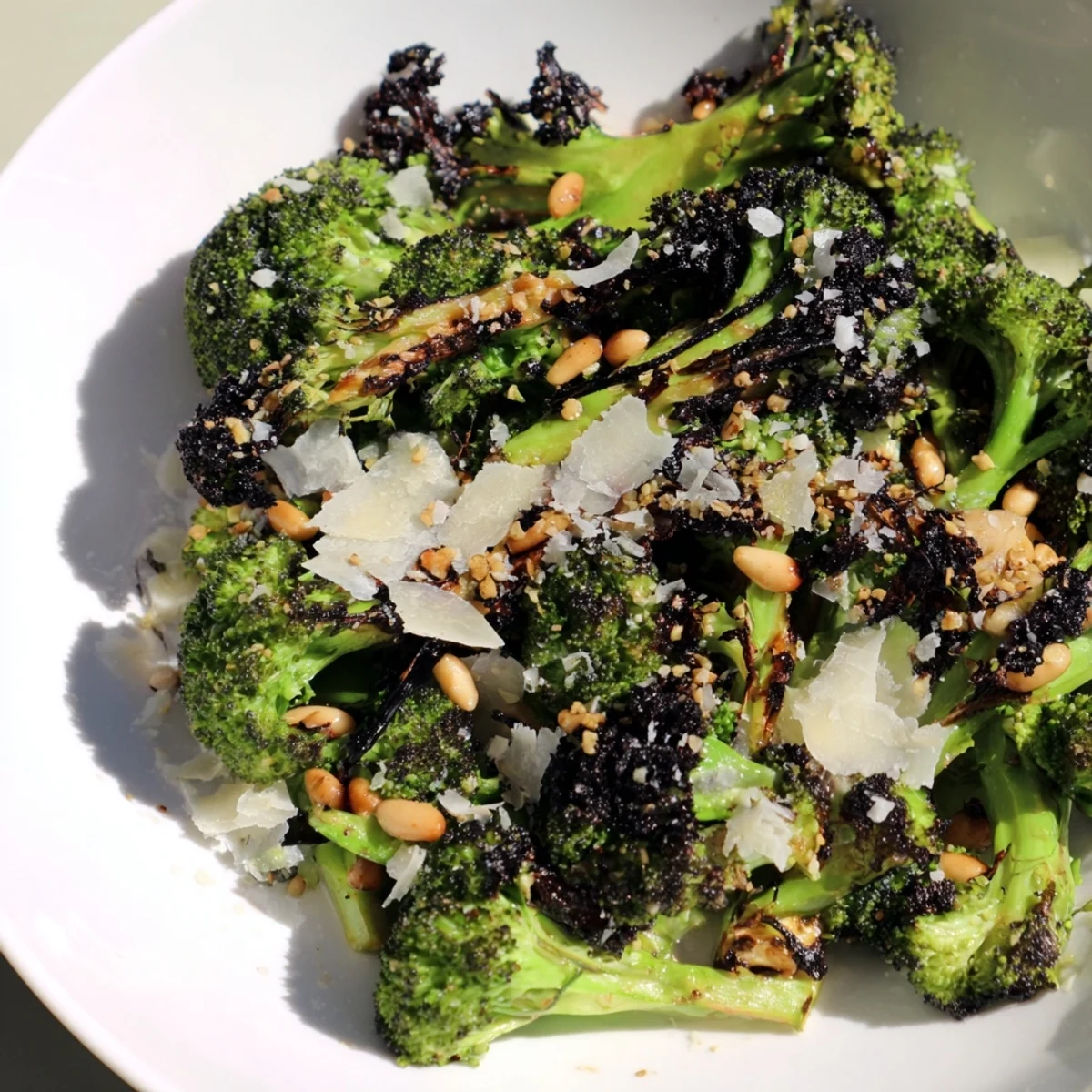 Roasted and vibrant charred broccoli salad tossed in lemon dressing, ready to be served.