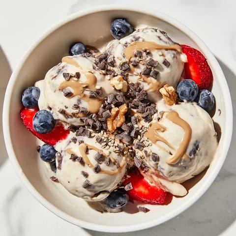 A close-up of a perfectly frozen Protein Ice Cream Bowl, ready for delicious toppings and enjoyment.