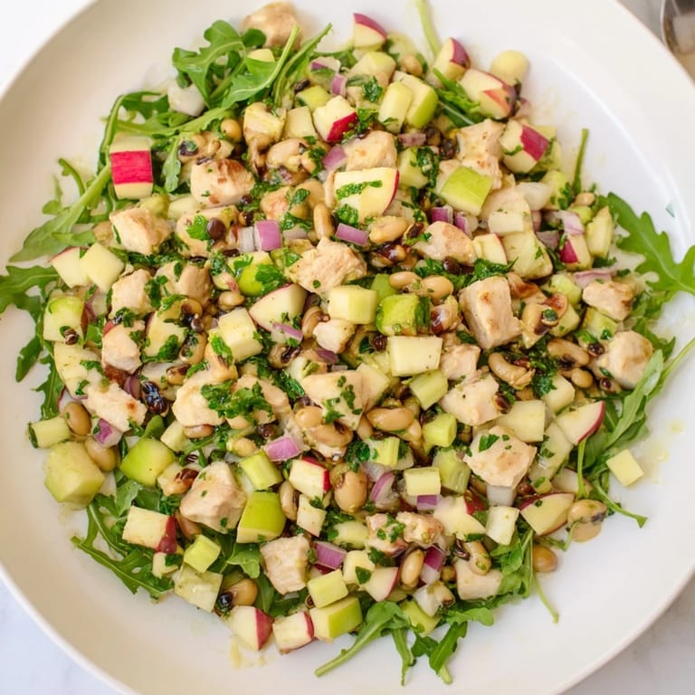 This Chicken and Apple New Years Luck Salad combines chicken, crisp apple pieces, and black-eyed peas, all ready to eat.