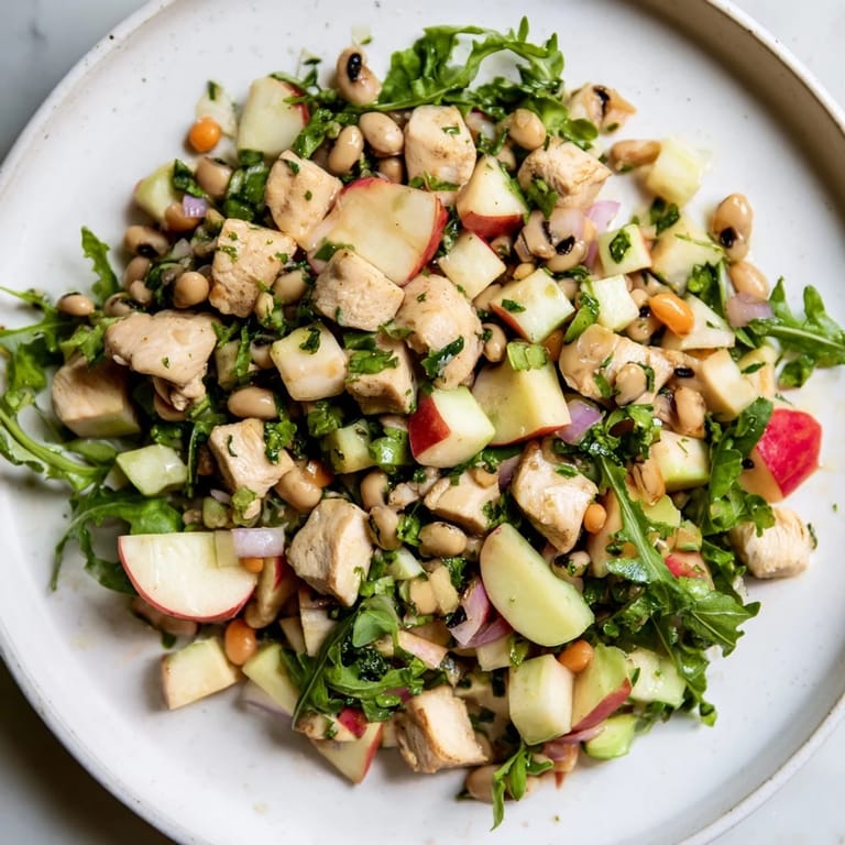Looking at the Chicken and Apple New Years Luck Salad, you imagine the blend of sweet, savory, and fresh tastes.