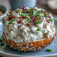 Creamy deviled eggs with tangy cream cheese and everything bagel seasoning for a bold brunch appetizer.  